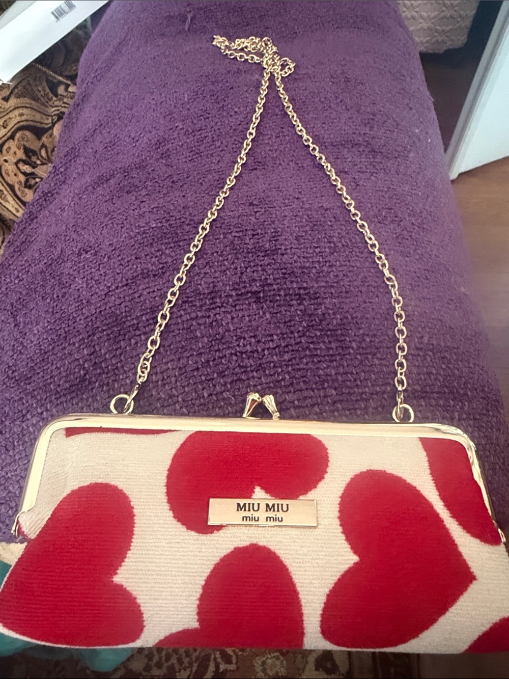 Miu Miu Cream Clutch with Red Heart Motif and Gold Chain
